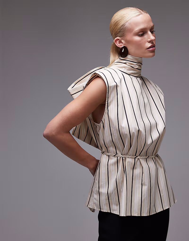 Блузка с подплечниками и завязкой на шее ASOS DESIGN в полоску цвета пахты
Блузка с подплечниками и завязкой на шее ASOS DESIGN в полоску цвета пахты