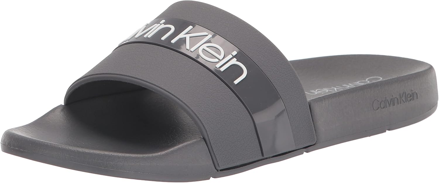 Мужские сандалии-слайды Calvin Klein Alongi, Dark Grey/White 020
Мужские сандалии-слайды Calvin Klein Alongi, Dark Grey/White 020