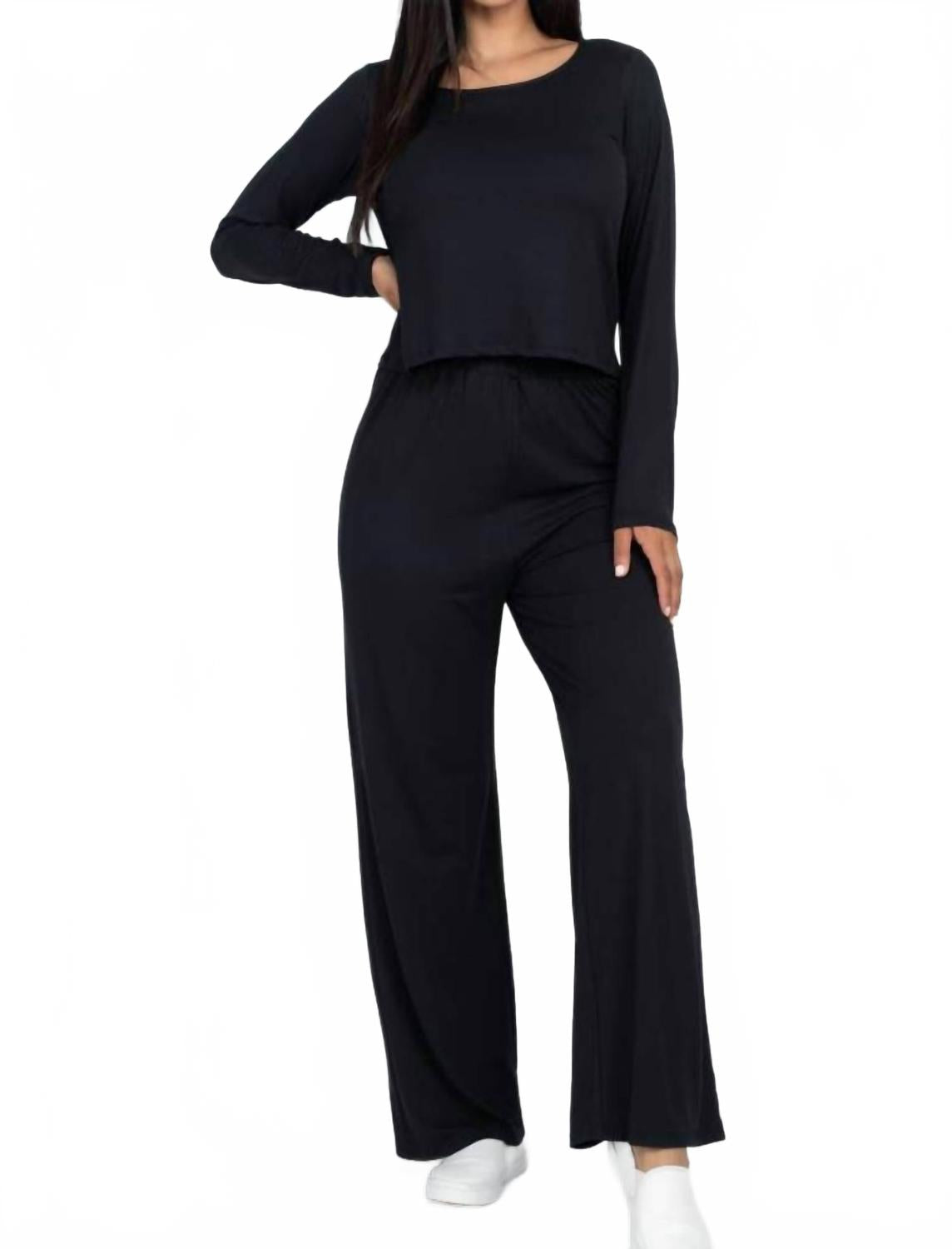 Черный комплект из топа и брюк для легкого ношения Capella
Черный комплект из топа и брюк для легкого ношения Capella