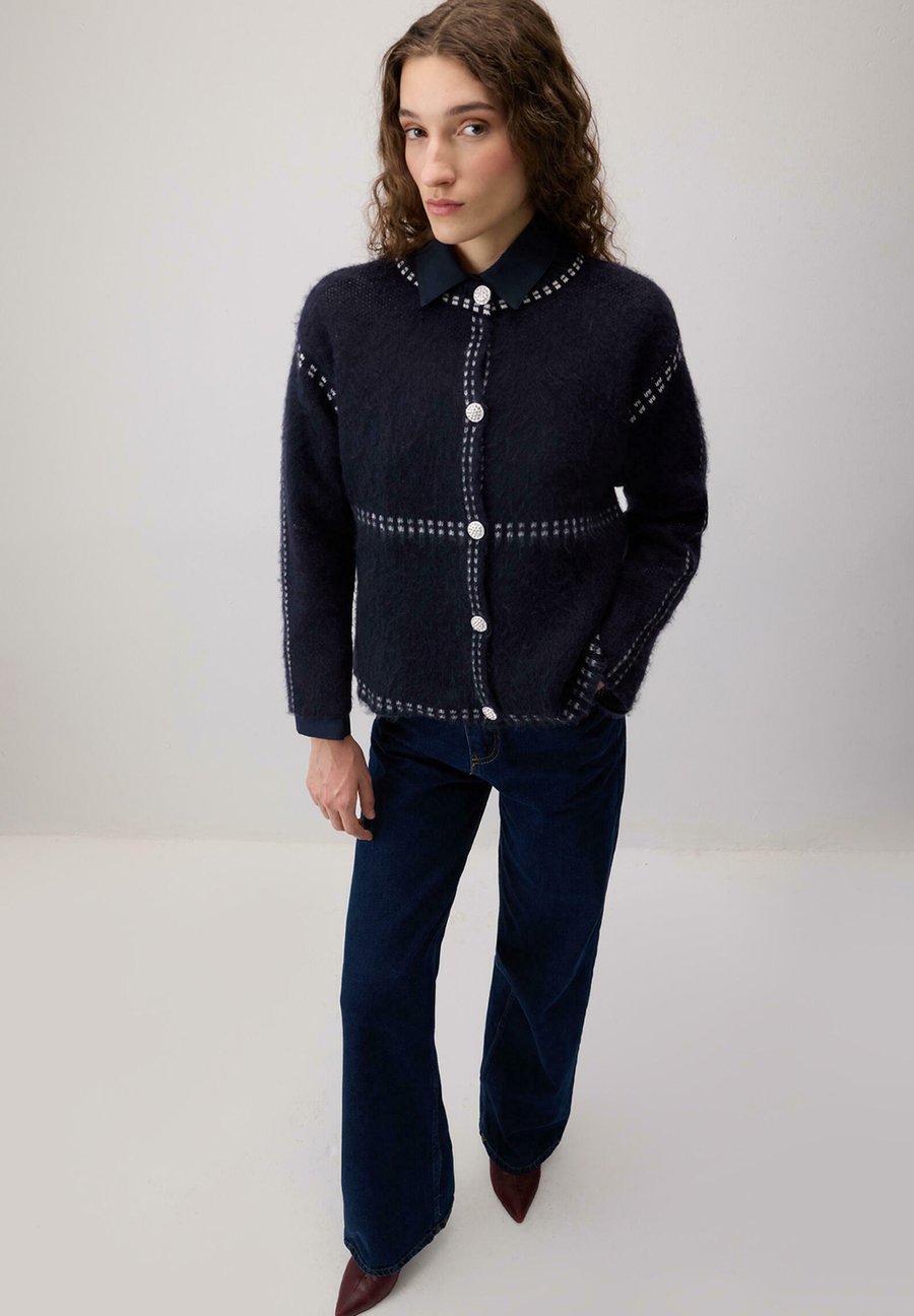 Кардиган Touché Privé Cardigan, Navy Blue/Dark Blue
Кардиган Touché Privé Cardigan, Navy Blue/Dark Blue
