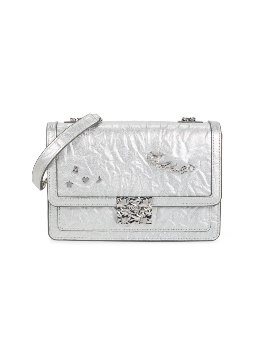 Кожаная сумка через плечо с графическим значком Corinne Karl Lagerfeld Paris, серебряный
Кожаная сумка через плечо с графическим значком Corinne Karl Lagerfeld Paris, серебряный