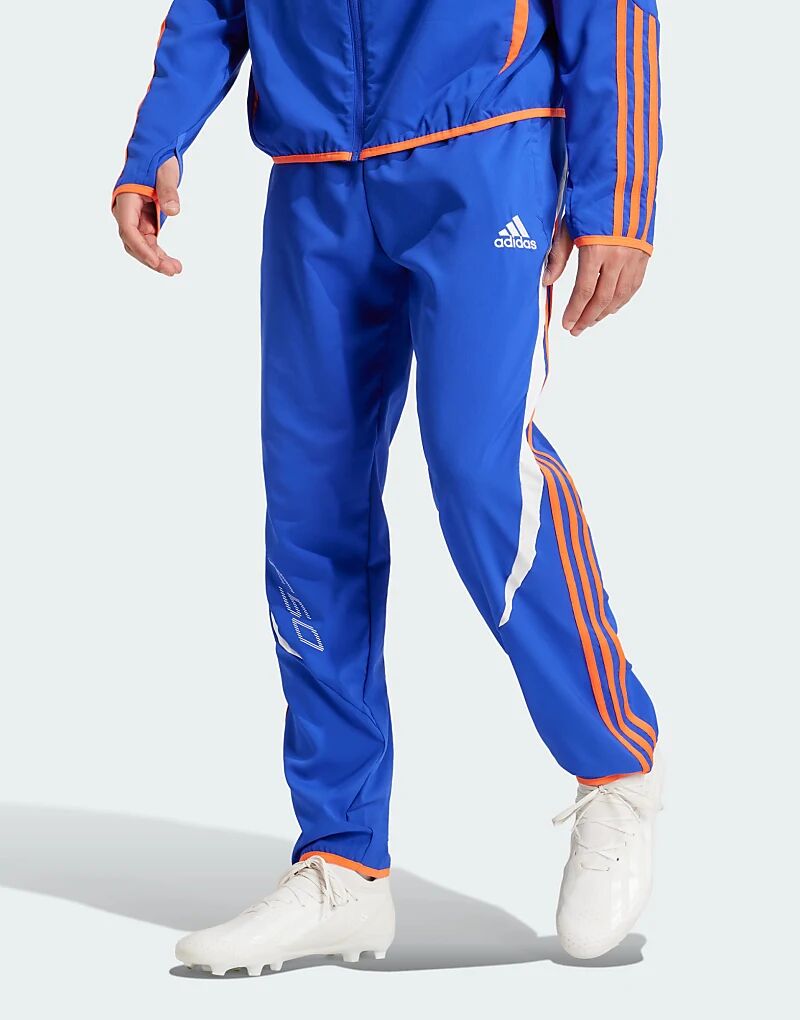 Тканые брюки F50 ярко-синего цвета adidas performance
Тканые брюки F50 ярко-синего цвета adidas performance