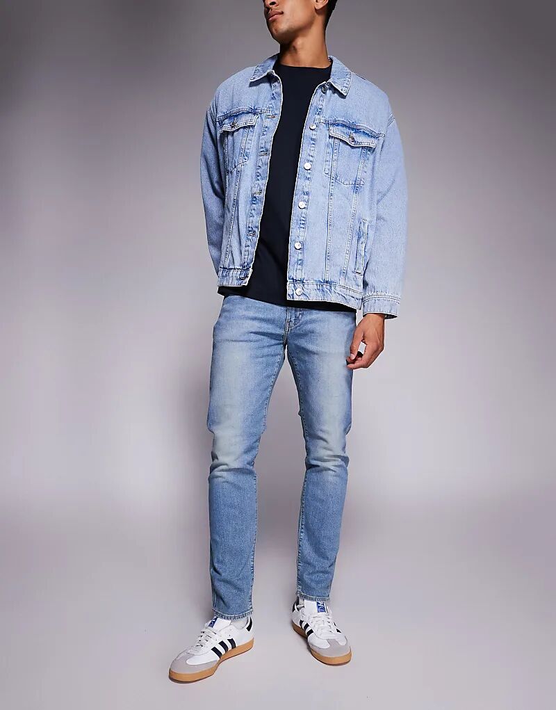 Джинсы Levi's 512 с зауженным кроем, средней степени стертости
Джинсы Levi's 512 с зауженным кроем, средней степени стертости