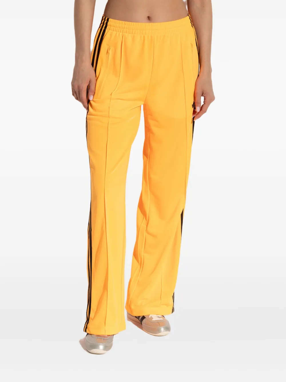 Спортивные брюки широкого кроя adidas, оранжевый 
Спортивные брюки широкого кроя adidas, оранжевый