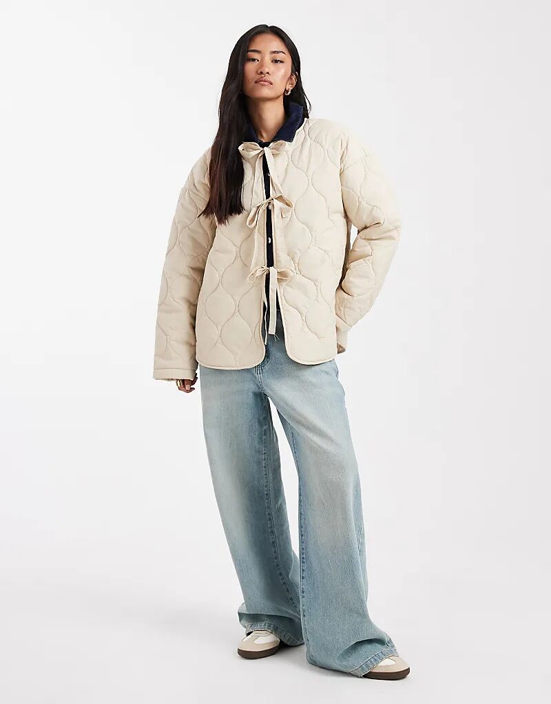 Стеганая куртка Vero Moda с завязкой спереди в овсяном цвете
Стеганая куртка Vero Moda с завязкой спереди в овсяном цвете