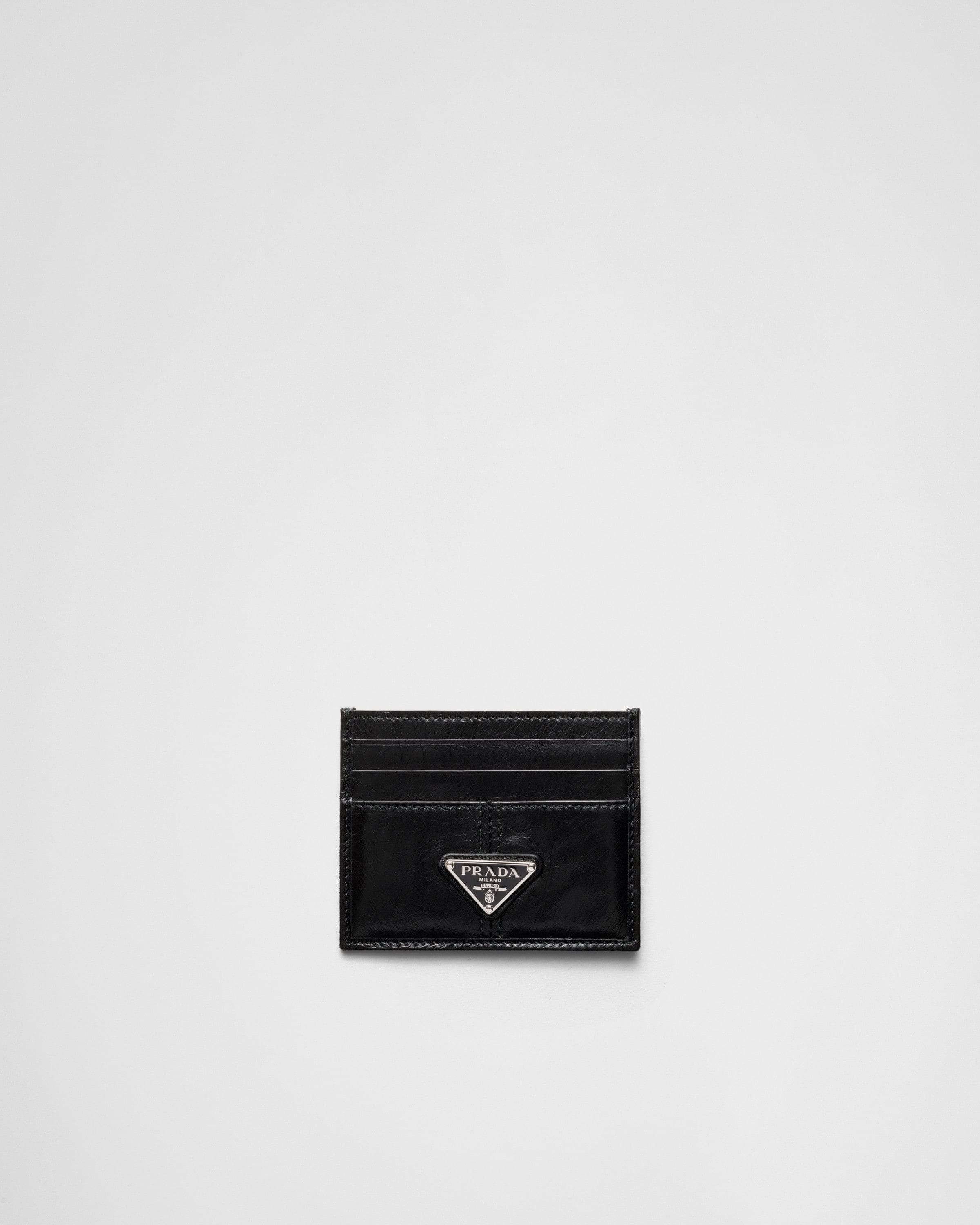 Кожаный держатель для карт Prada, черный
Кожаный держатель для карт Prada, черный