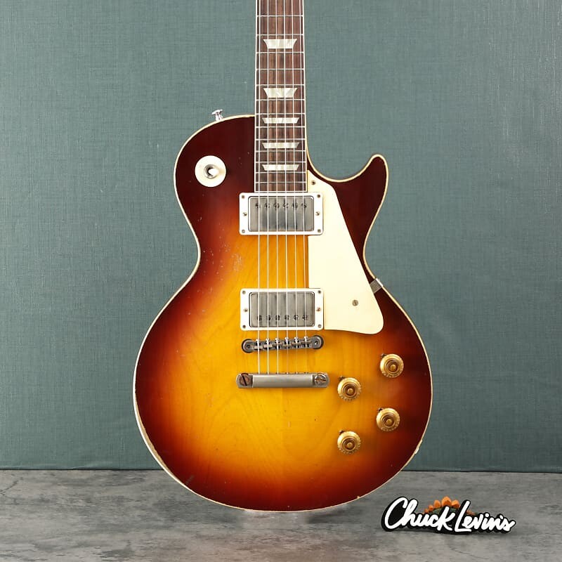 Электрогитара Gibson Murphy Lab 1958 Les Paul Standard - Ultra Heavy Aged Royal Tea Burst - CHUCKSCLUSIVE - #821493
Электрогитара Gibson Murphy Lab 1958 Les Paul Standard - Ultra Heavy Aged Royal Tea Burst - CHUCKSCLUSIVE - #821493