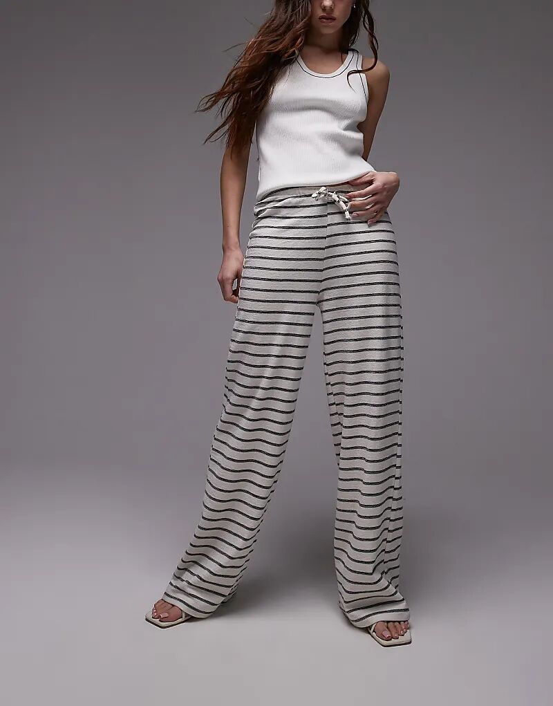 Широкие брюки Topshop в полоску на завязках цвета экрю
Широкие брюки Topshop в полоску на завязках цвета экрю