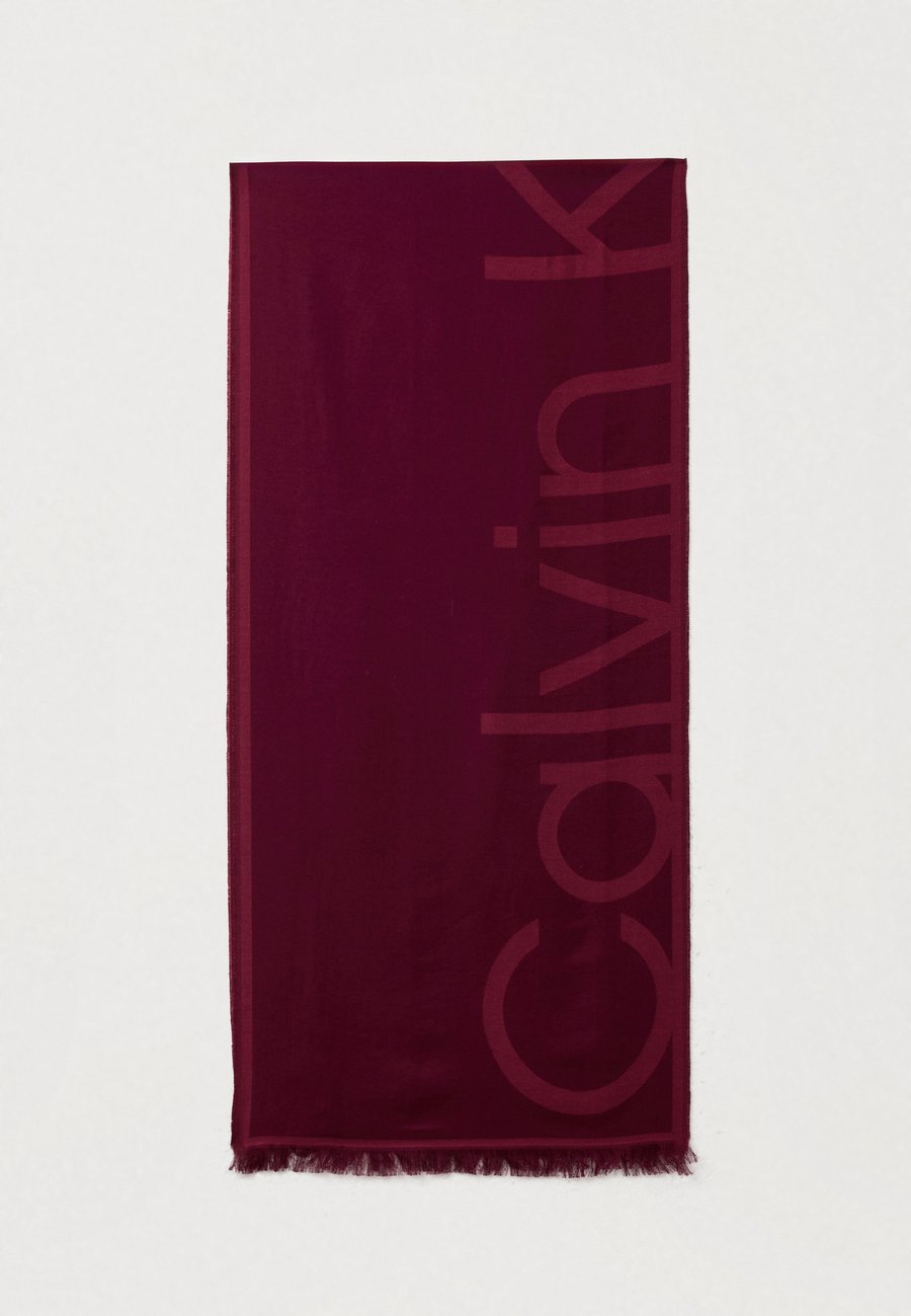Шарф Calvin Klein OVERSIZED LOGO STOLE UNISEX, Alluring Pink/Framboise/Bordeaux
Шарф Calvin Klein OVERSIZED LOGO STOLE UNISEX, Alluring Pink/Framboise/Bordeaux