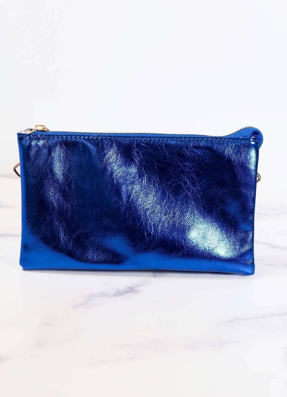 Женская сумка-кроссбоди Liz с тремя отделениями в металлизированном королевском синем цвете Caroline Hill
Женская сумка-кроссбоди Liz с тремя отделениями в металлизированном королевском синем цвете Caroline Hill