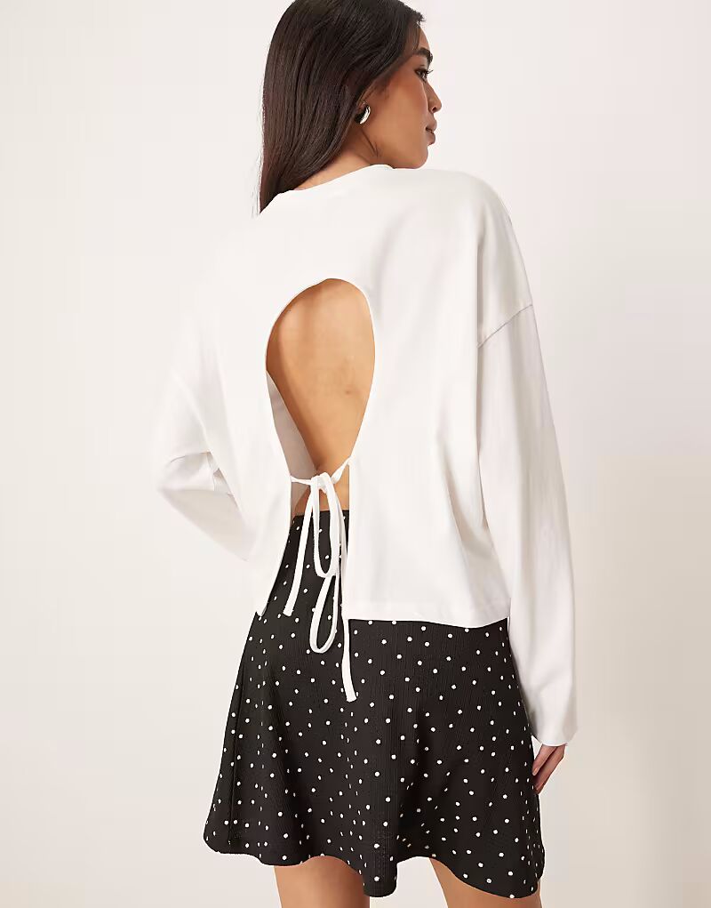 Белая футболка с длинными рукавами и завязкой сзади от ASOS DESIGN
Белая футболка с длинными рукавами и завязкой сзади от ASOS DESIGN