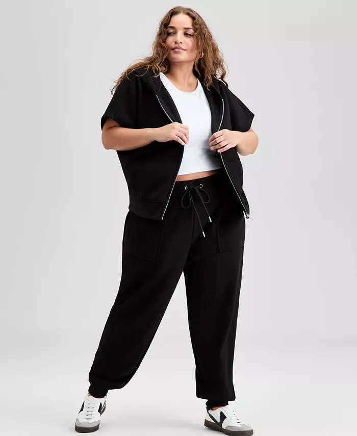 Трендовые спортивные брюки больших размеров из водолазного трикотажа And Now This, черный 
Трендовые спортивные брюки больших размеров из водолазного трикотажа And Now This, черный