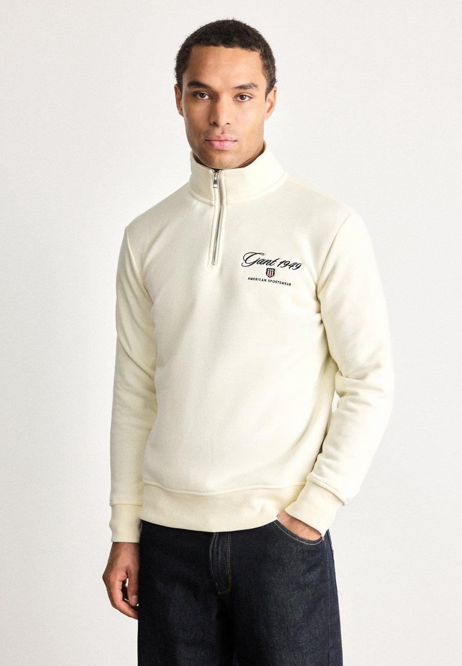 Толстовка GANT GRAPHIC HALF ZIP, Cream/Off-White
Толстовка GANT GRAPHIC HALF ZIP, Cream/Off-White