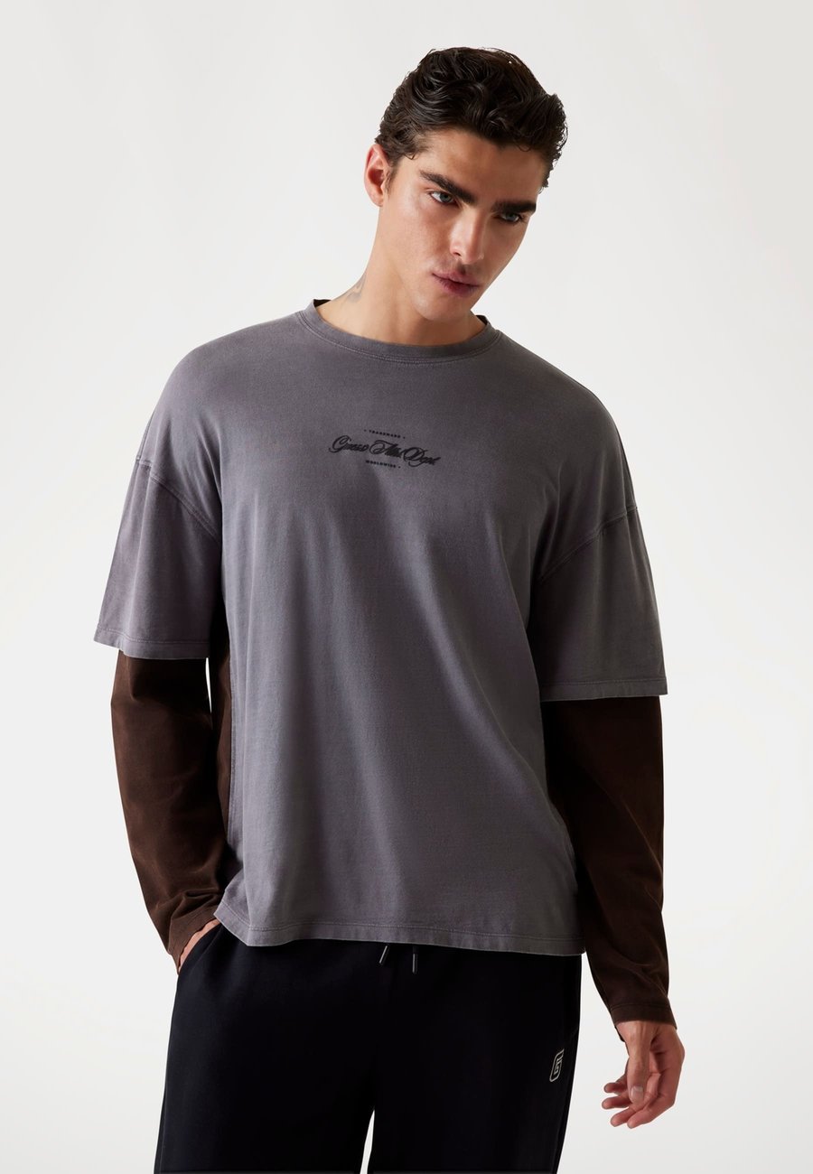 Топ Guess Long sleeved top, Grau/Grey
Топ Guess Long sleeved top, Grau/Grey