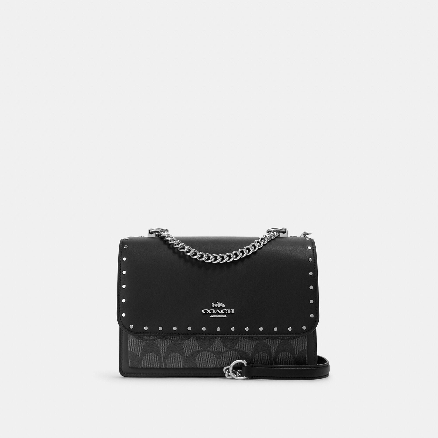 Сумка через плечо Coach Outlet Klare из фирменной парусины с заклепками, цвет Silver/Graphite/Black Multi
Сумка через плечо Coach Outlet Klare из фирменной парусины с заклепками, цвет Silver/Graphite/Black Multi
