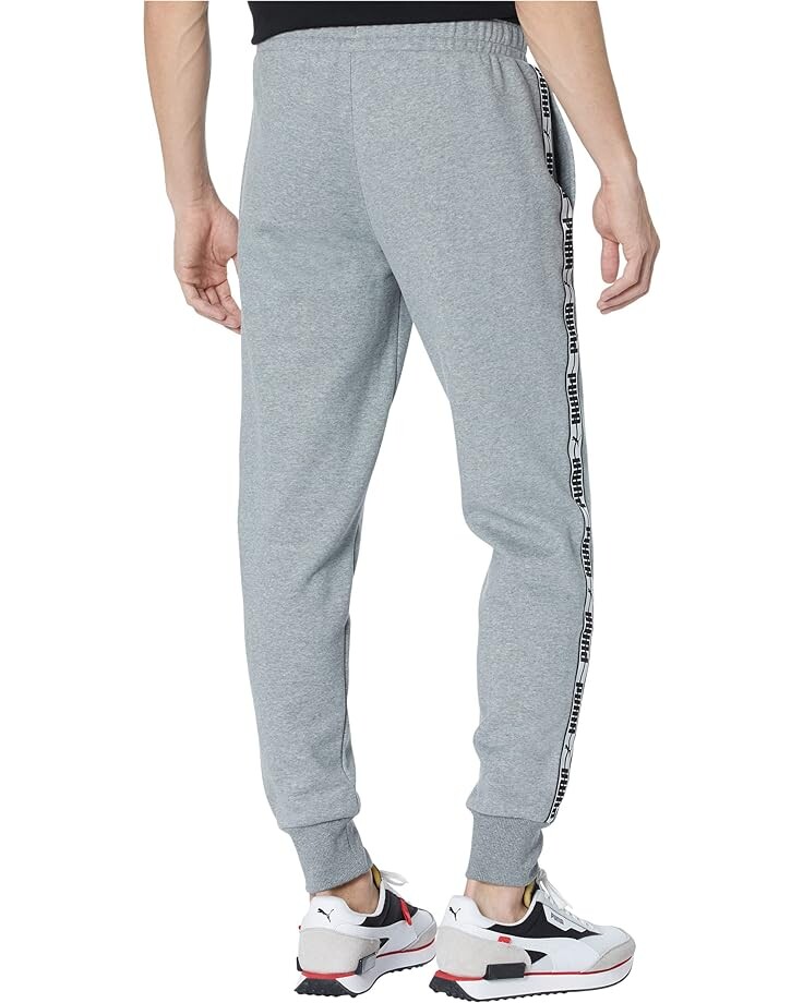 Брюки PUMA Taping Pants Fleece, цвет Medium Gray Heather/PUMA Black 
Брюки PUMA Taping Pants Fleece, цвет Medium Gray Heather/PUMA Black
