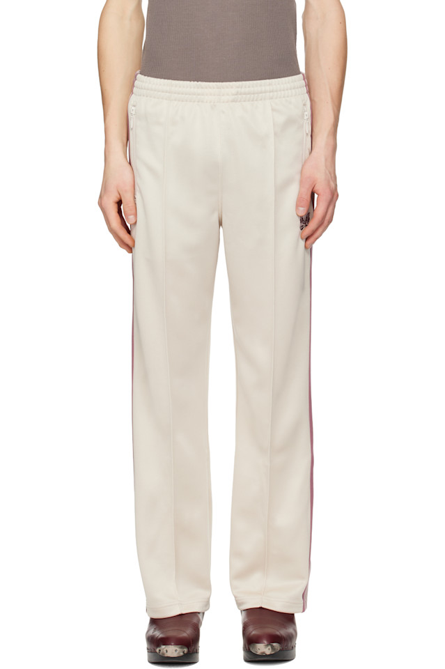 Needles Спортивные брюки Off White из гладкого полиэстера
Needles Спортивные брюки Off White из гладкого полиэстера