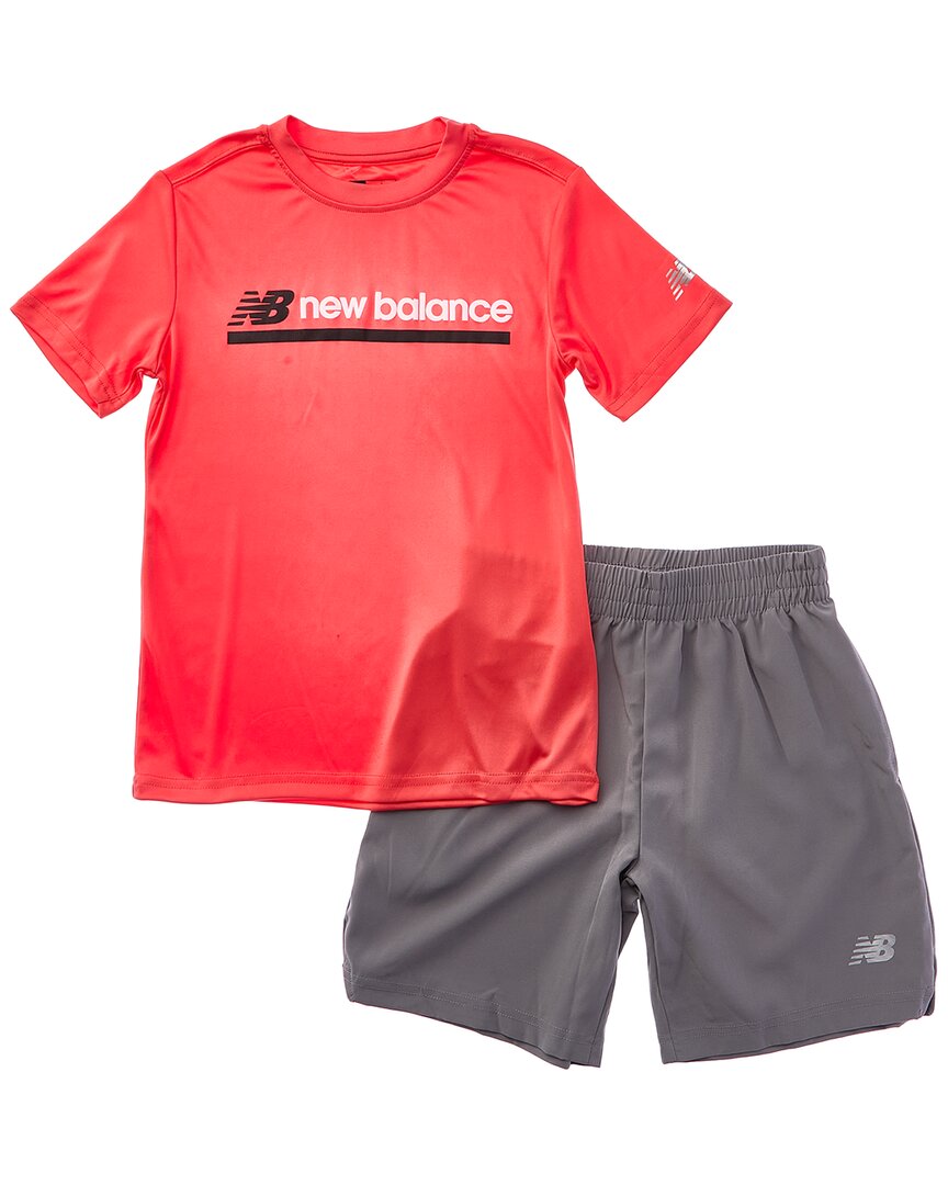 New Balance Комплект из футболки и шорт, красный
New Balance Комплект из футболки и шорт, красный