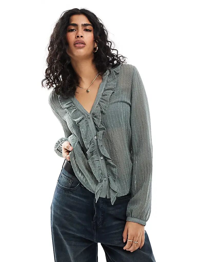 Рубашка с оборками цвета хаки Stradivarius
Рубашка с оборками цвета хаки Stradivarius