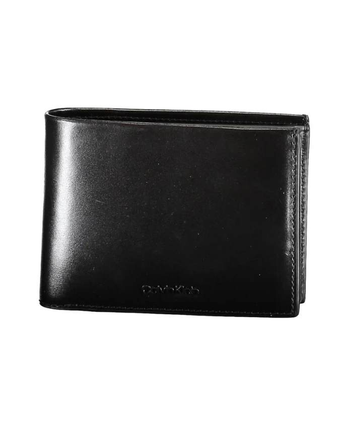 Черный кожаный мужской кошелек с защитой от RFID-сканирования. Calvin Klein, черный
Черный кожаный мужской кошелек с защитой от RFID-сканирования. Calvin Klein, черный