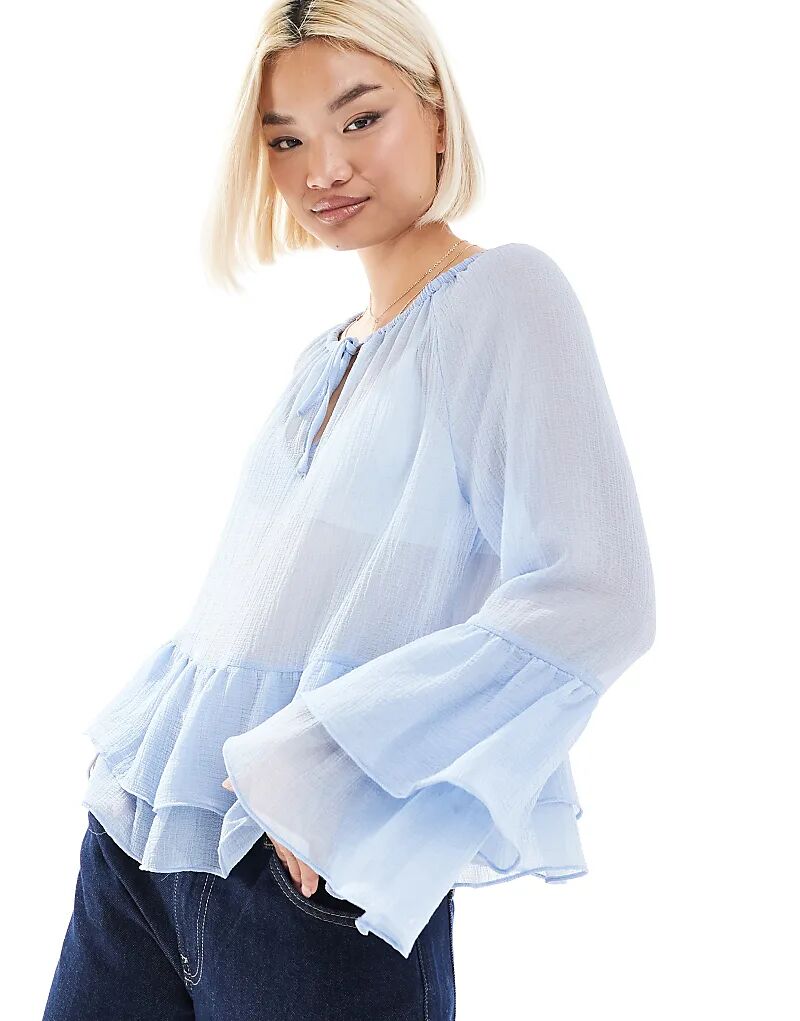 Прозрачная блузка в стиле бохо с оборками нежно-голубого цвета Pieces
Прозрачная блузка в стиле бохо с оборками нежно-голубого цвета Pieces