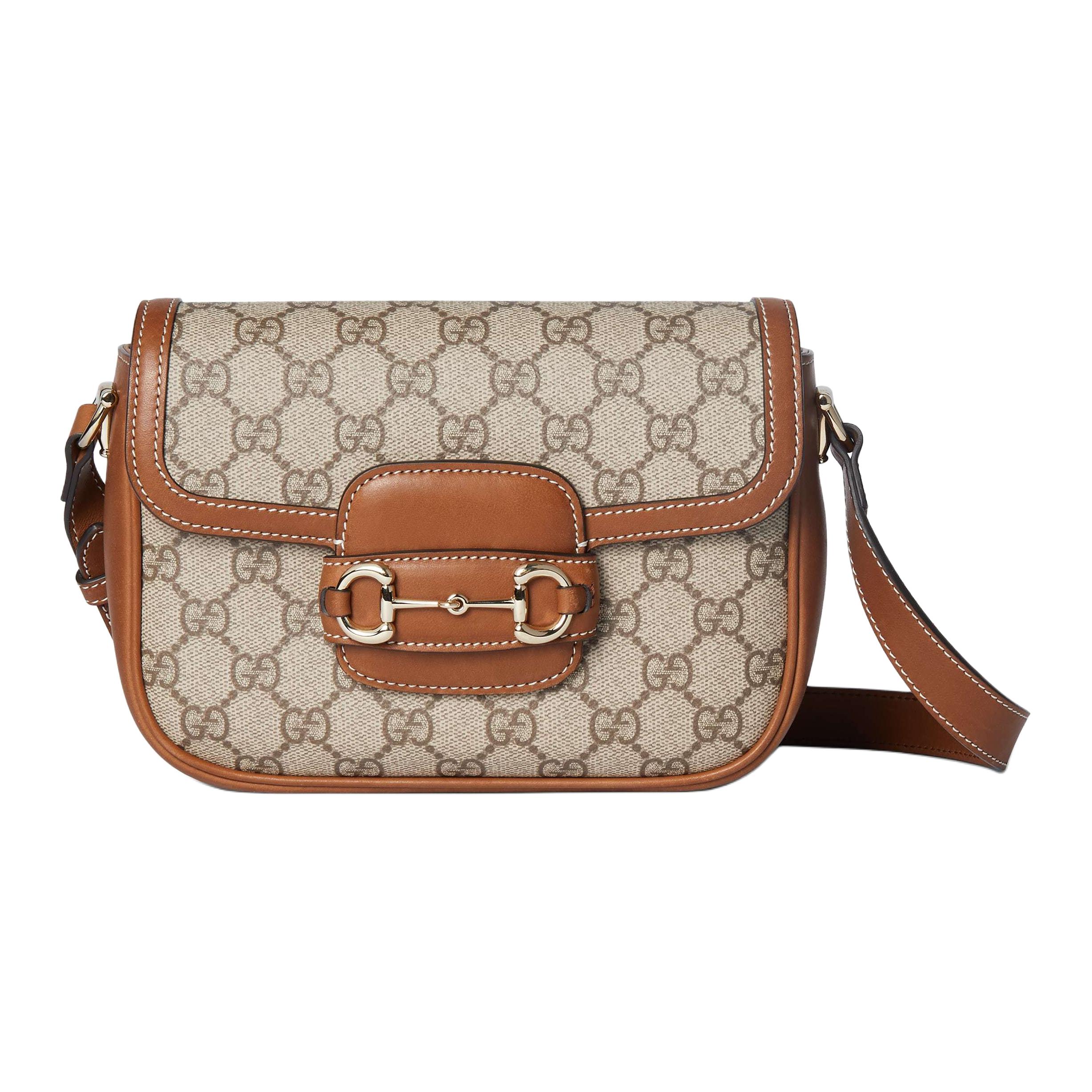 GUCCI Сумка-сэдл через плечо мини унисекс бежевая и темно-коричневая
GUCCI Сумка-сэдл через плечо мини унисекс бежевая и темно-коричневая