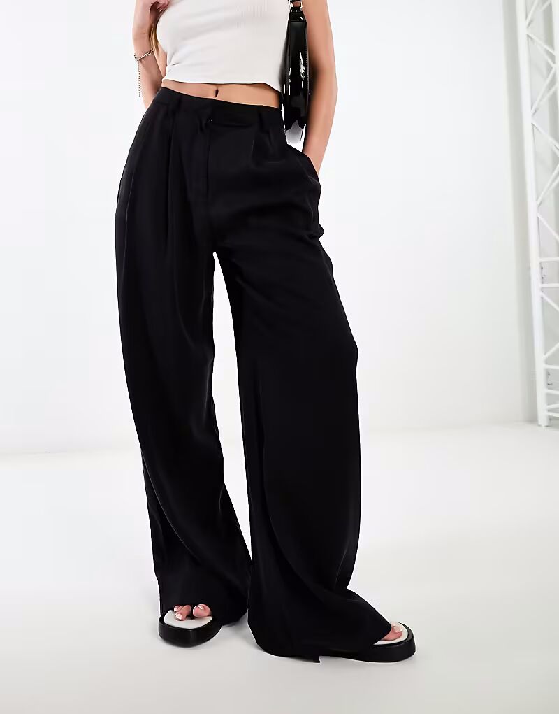 Повседневные брюки широкого кроя черного цвета Asos Design
Повседневные брюки широкого кроя черного цвета Asos Design