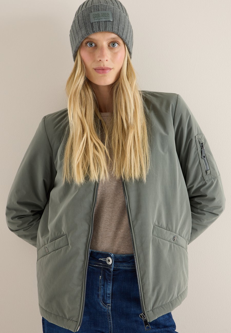 Шапка Cecil UNIFARBE, Grün/Green
Шапка Cecil UNIFARBE, Grün/Green