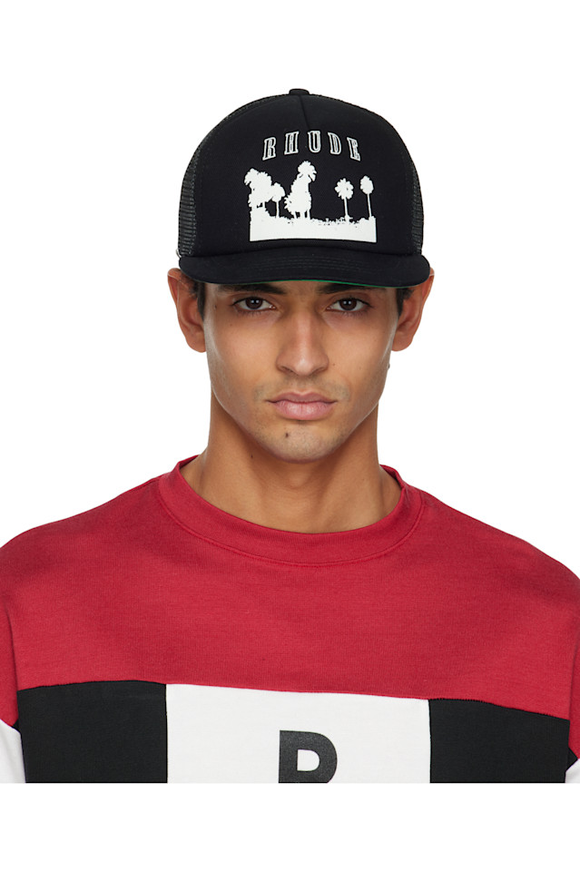 Rhude Черная кепка дальнобойщика "Тысяча пальм"
Rhude Черная кепка дальнобойщика "Тысяча пальм"