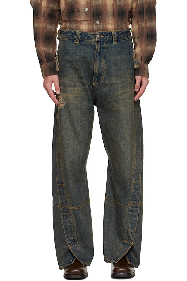 Andersson Bell Синие джинсы с закрученными молниями и карманами
Andersson Bell Синие джинсы с закрученными молниями и карманами