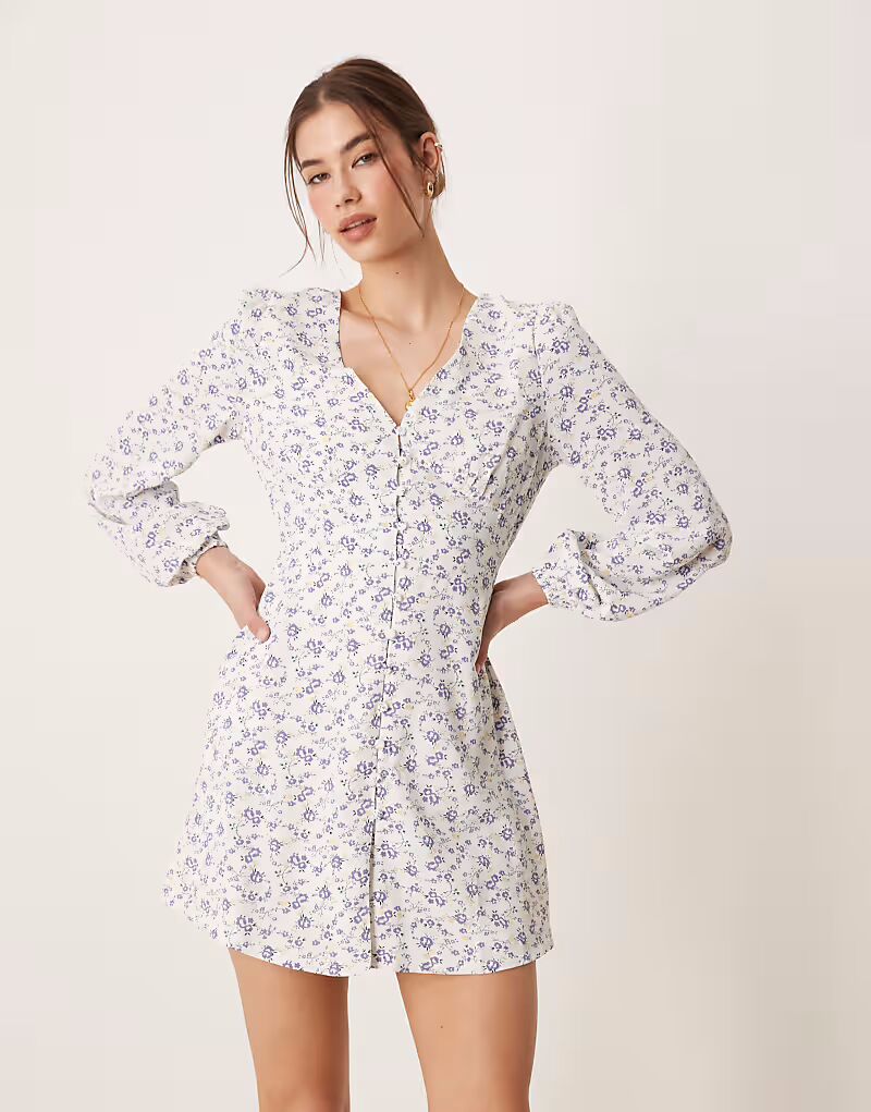 Гламурное мини-платье на пуговицах спереди в сиренево-желтых тонах Glamorous
Гламурное мини-платье на пуговицах спереди в сиренево-желтых тонах Glamorous