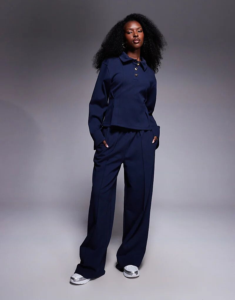 Широкие брюки-интерлок ASOS DESIGN темно-синего цвета
Широкие брюки-интерлок ASOS DESIGN темно-синего цвета