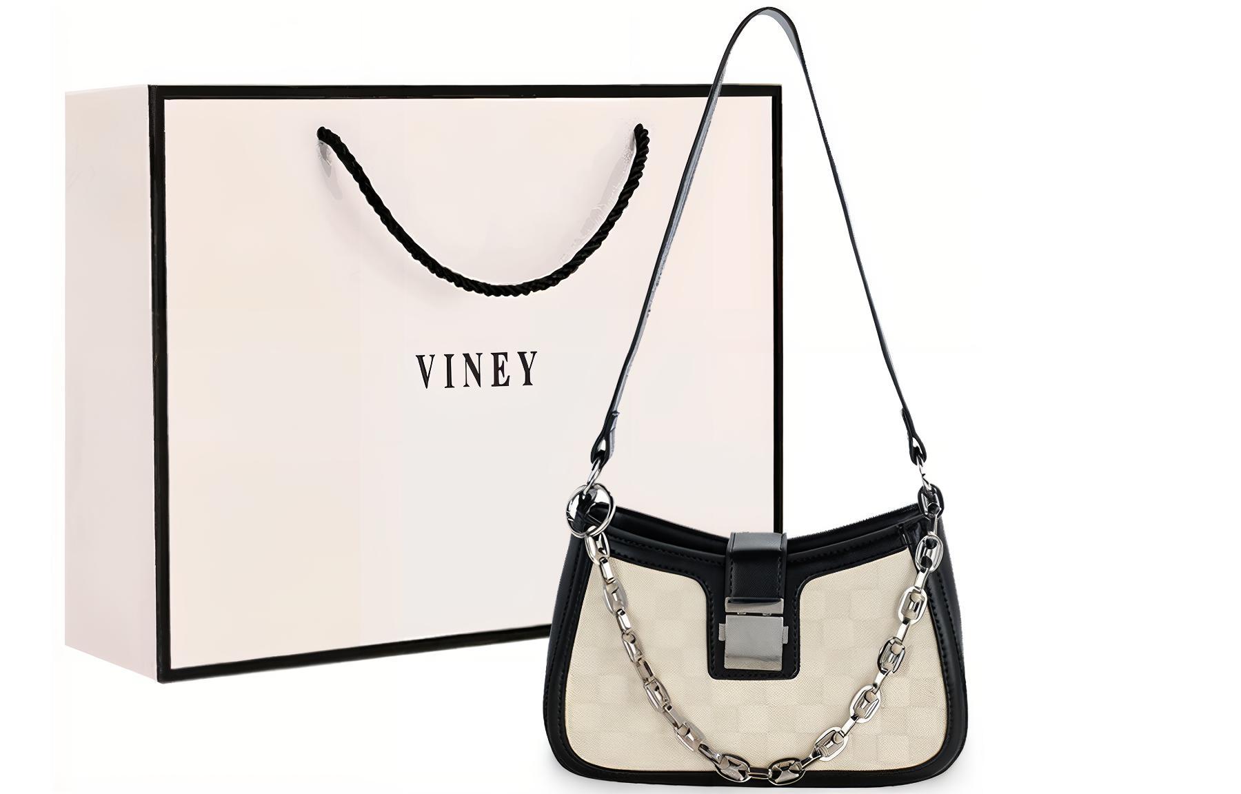 Синтетическая кожаная сумка через плечо полумесяц маленького размера женская экрю VINEY
Синтетическая кожаная сумка через плечо полумесяц маленького размера женская экрю VINEY