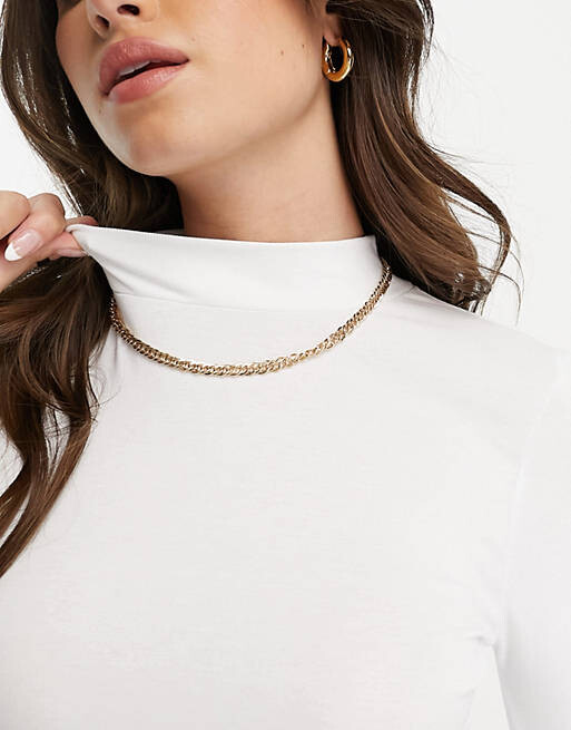 Белое боди с длинными рукавами и высоким воротником ASOS DESIGN
Белое боди с длинными рукавами и высоким воротником ASOS DESIGN