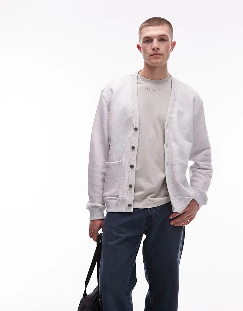 Кардиган ARKET средней плотности из махровой ткани с V-образным вырезом светло-серого цвета
Кардиган ARKET средней плотности из махровой ткани с V-образным вырезом светло-серого цвета