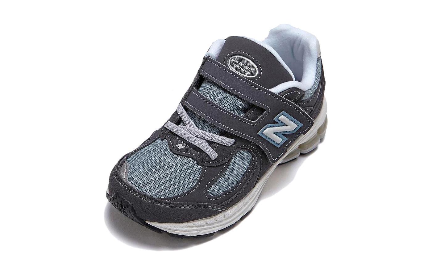 Низкие детские беговые кроссовки New Balance 2002R с амортизацией и износостойкостью черно-синие 
Низкие детские беговые кроссовки New Balance 2002R с амортизацией и износостойкостью черно-синие