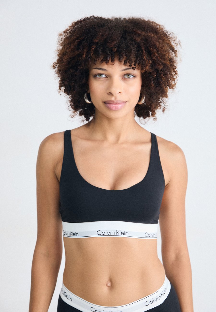 Бюстгальтер Calvin Klein Underwear LIGHTLY LINED BRALETTE ICON, Black
Бюстгальтер Calvin Klein Underwear LIGHTLY LINED BRALETTE ICON, Black