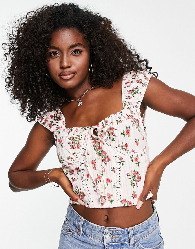 Топ на пуговицах ASOS DESIGN с кружевной вставкой и присборенным рукавом с цветочным принтом
Топ на пуговицах ASOS DESIGN с кружевной вставкой и присборенным рукавом с цветочным принтом