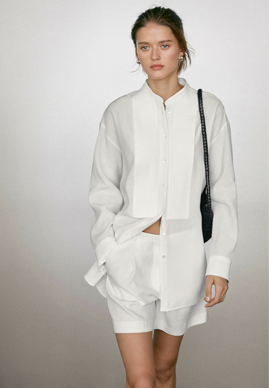 Блуза Massimo Dutti BLEND GARMENT WITH THIN PINTUCKS, White
Блуза Massimo Dutti BLEND GARMENT WITH THIN PINTUCKS, White