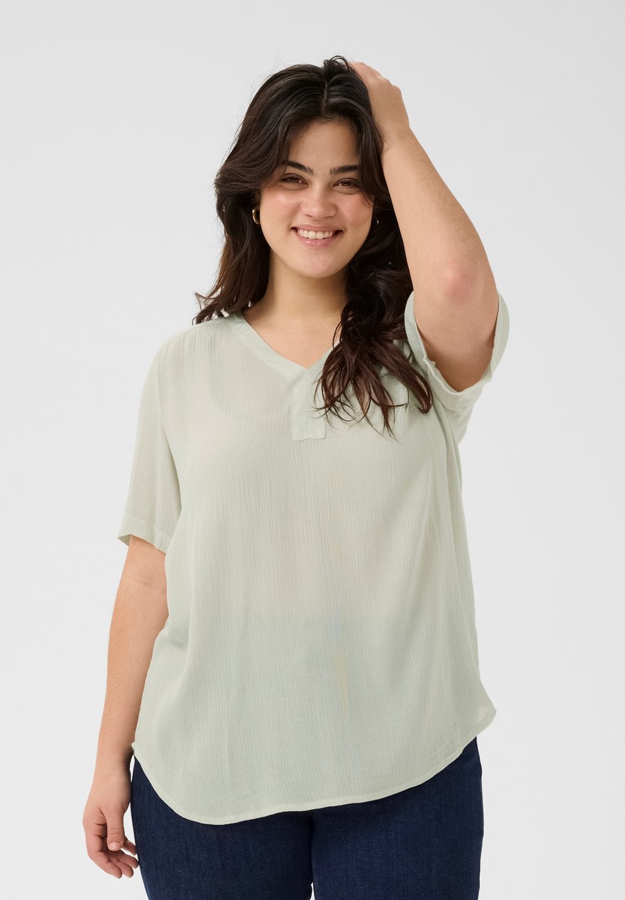 Блуза Kaffe Curve AMI, Moonstruck/Mottled Beige
Блуза Kaffe Curve AMI, Moonstruck/Mottled Beige