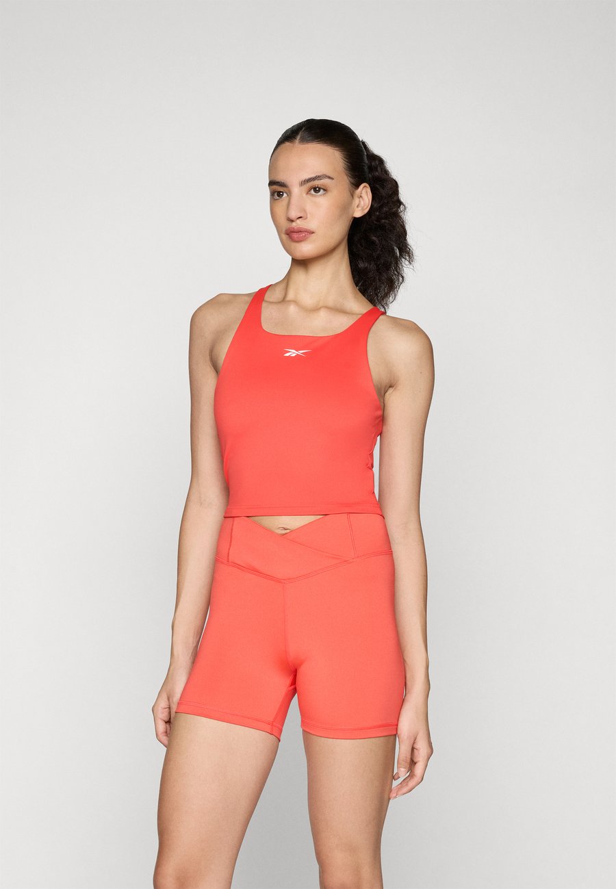 Топ Reebok TRAIN ASYMMETRICAL STRAP TANK, Energy Red/Red
Топ Reebok TRAIN ASYMMETRICAL STRAP TANK, Energy Red/Red