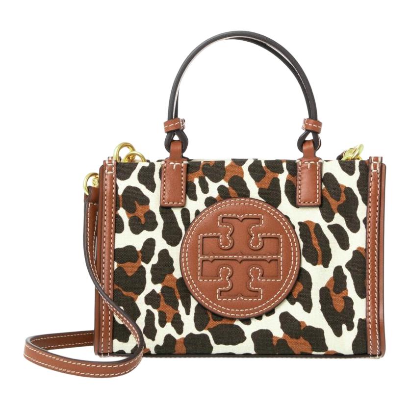 Сумка-тоут из кожи телёнка Ella, шоппер, через плечо, миниатюрная дамская сумка с леопардовым принтом TORY BURCH
Сумка-тоут из кожи телёнка Ella, шоппер, через плечо, миниатюрная дамская сумка с леопардовым принтом TORY BURCH