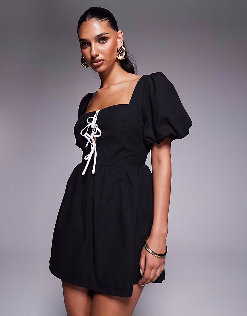 Комбинезон принцессы Полли Маэль из хлопковой смеси с рукавами-фонариками, контрастной завязкой спереди и открытой спиной в черно-белом цвете Princess Polly
Комбинезон принцессы Полли Маэль из хлопковой смеси с рукавами-фонариками, контрастной завязкой спереди и открытой спиной в черно-белом цвете Princess Polly