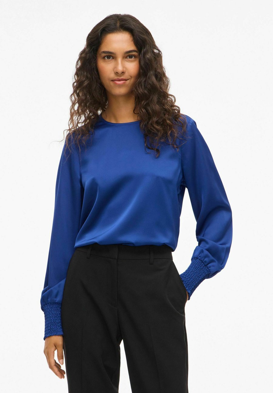 Блуза VILA MIT LANGEN ÄRMELN VIELLETTE RUNDHALS, Mazarine Blue/Blue
Блуза VILA MIT LANGEN ÄRMELN VIELLETTE RUNDHALS, Mazarine Blue/Blue