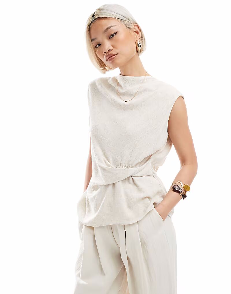 Топ без рукавов с воротником-хомутиком и перекрученной деталью на талии из льняной смеси ASOS DESIGN
Топ без рукавов с воротником-хомутиком и перекрученной деталью на талии из льняной смеси ASOS DESIGN