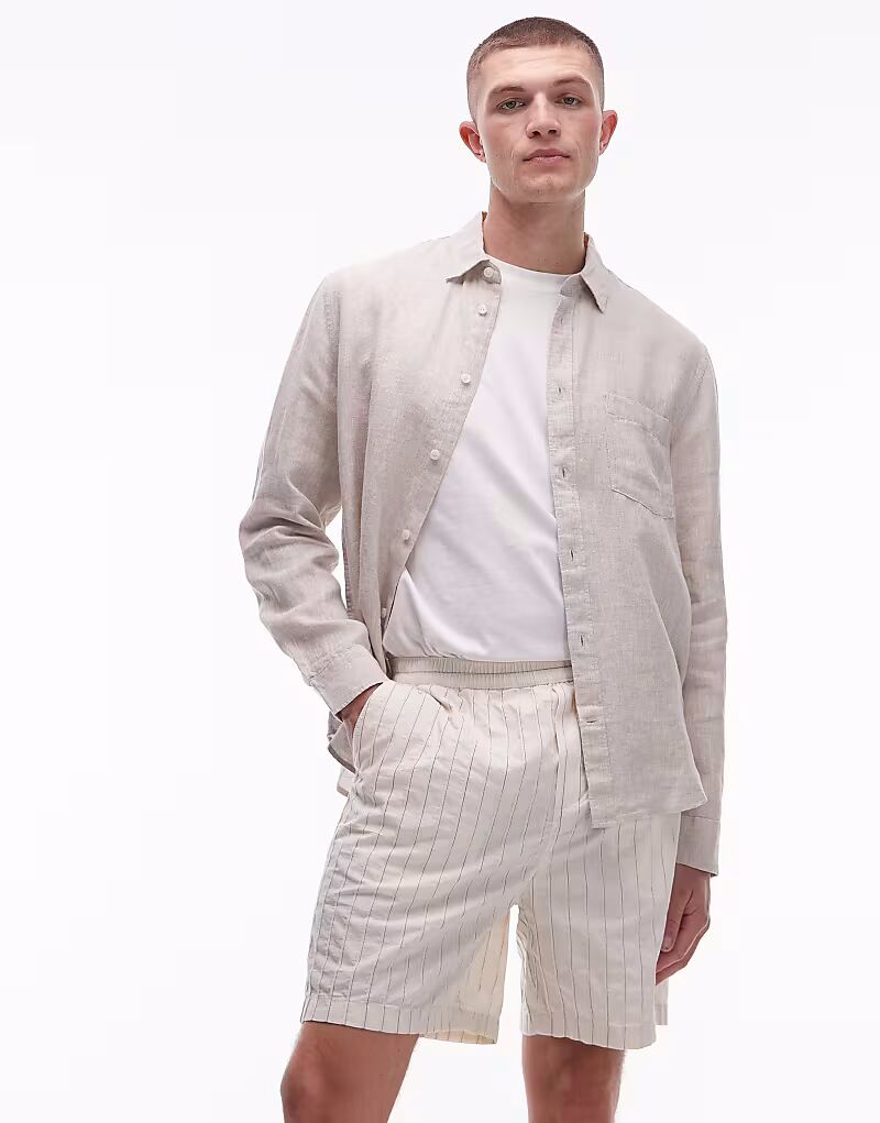 Шорты-накидки ARKET из текстурированного хлопка с волокном белого цвета
Шорты-накидки ARKET из текстурированного хлопка с волокном белого цвета