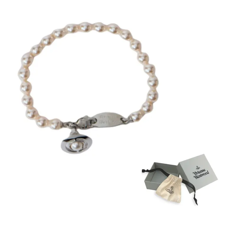 Браслет с подвеской Orb и декором Vivienne Westwood
Браслет с подвеской Orb и декором Vivienne Westwood