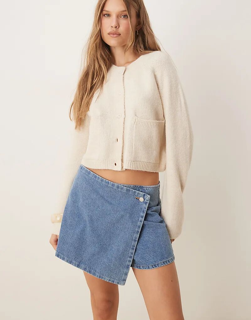 Юбка-шорты Mango из 100% хлопкового денима синего цвета
Юбка-шорты Mango из 100% хлопкового денима синего цвета