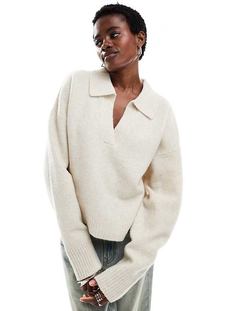 Кремово-белый вязаный джемпер-поло Monki
Кремово-белый вязаный джемпер-поло Monki