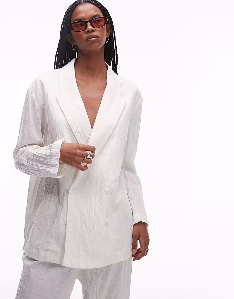 Комбинируемый блейзер из смеси льна и плиссе, белый цвет Mango
Комбинируемый блейзер из смеси льна и плиссе, белый цвет Mango